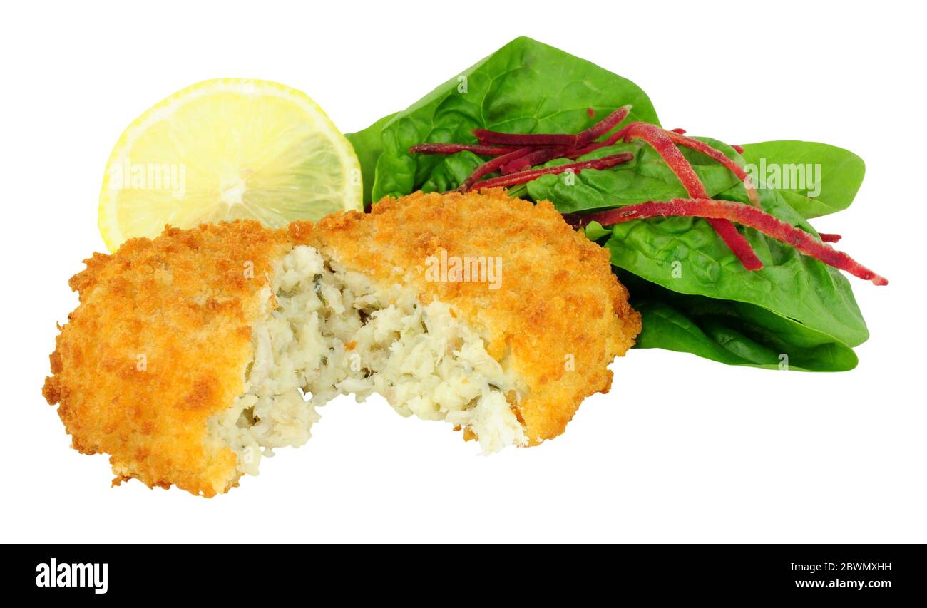 Breadcrumb covered cod fish cake isolated on a white background Stock Photo