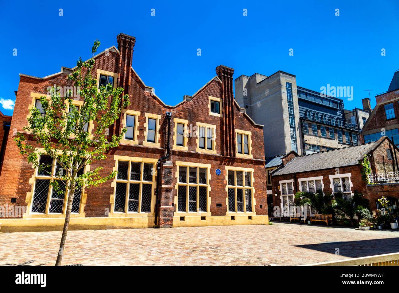 Exterior of Toynbee Hall, charitable institution that works to address the causes and impacts of poverty in the East End of London, UK Stock Photo