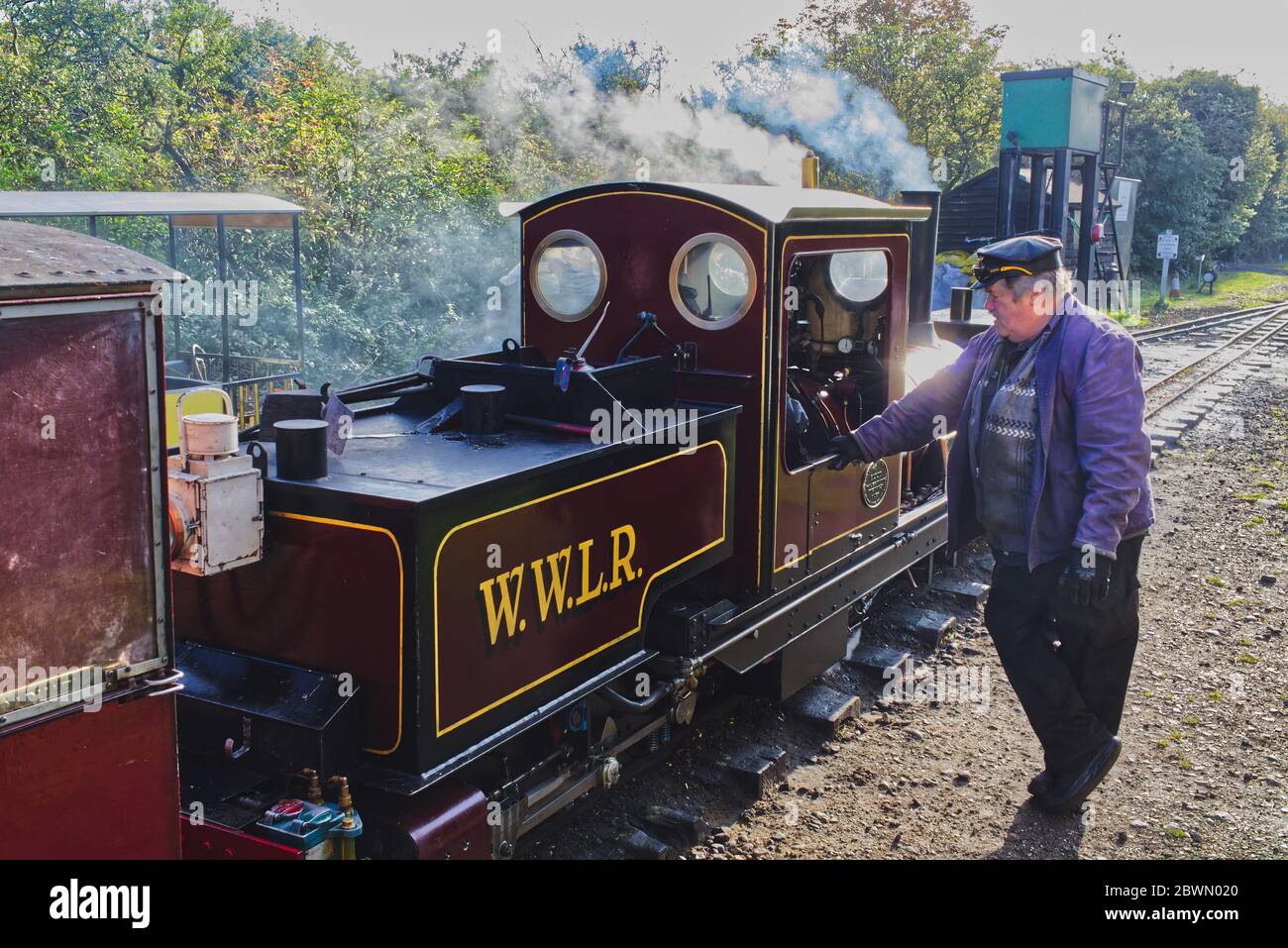Wells & Walsingham Light Railway, Wells-next-the-Sea, Norfolk, UK. Train driver of steam locomotive 'Norfolk Heroine' Stock Photo