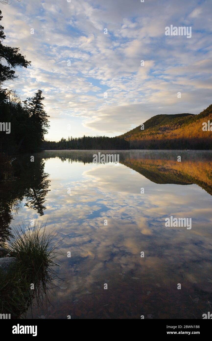 Upper Hall Pond in Sandwich, New Hampshire on a cloudy morning. This is a secluded pond located