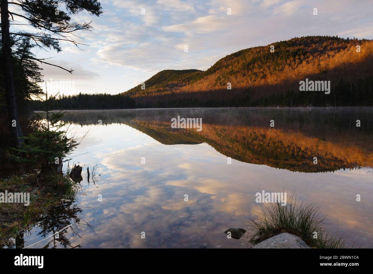 Upper Hall Pond in Sandwich, New Hampshire on a cloudy morning. This is a secluded pond located