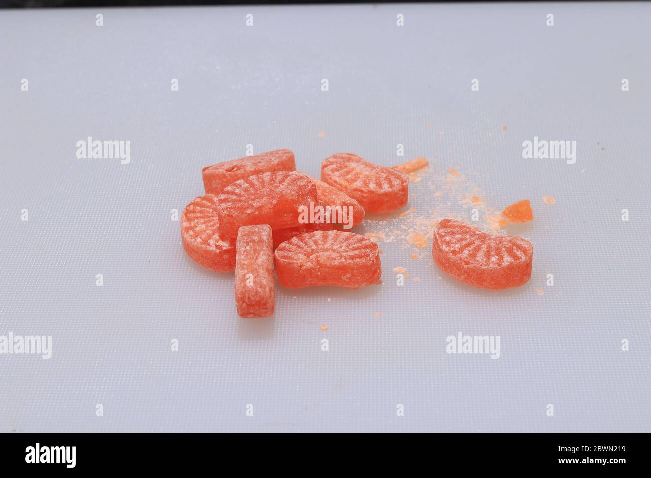 Famous orange color candy or peppermint in India Stock Photo Alamy