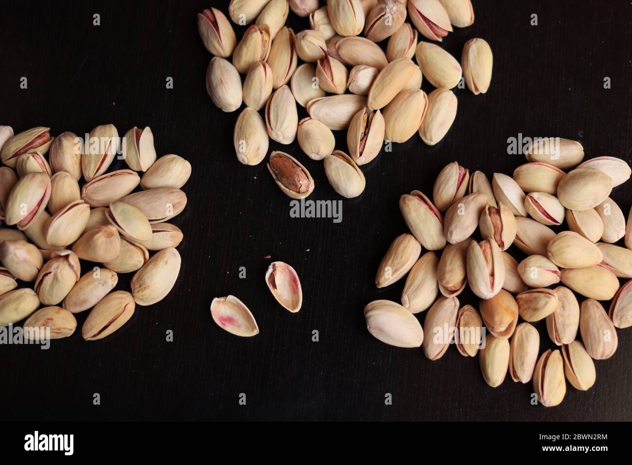 Pistachios Dry fruits isolated on Black background Stock Photo Alamy