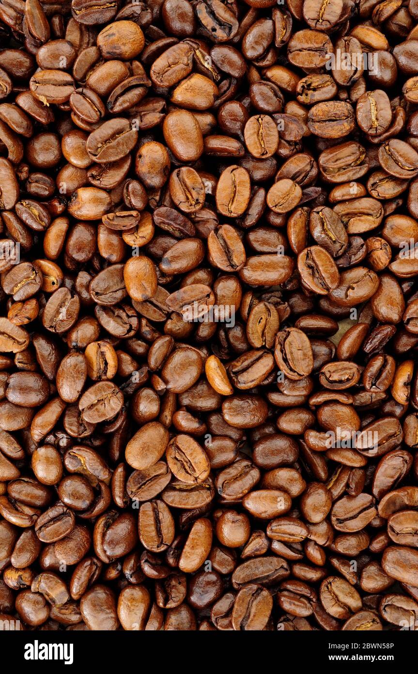 Aromatic fresh roasted coffee bean background texture Stock Photo