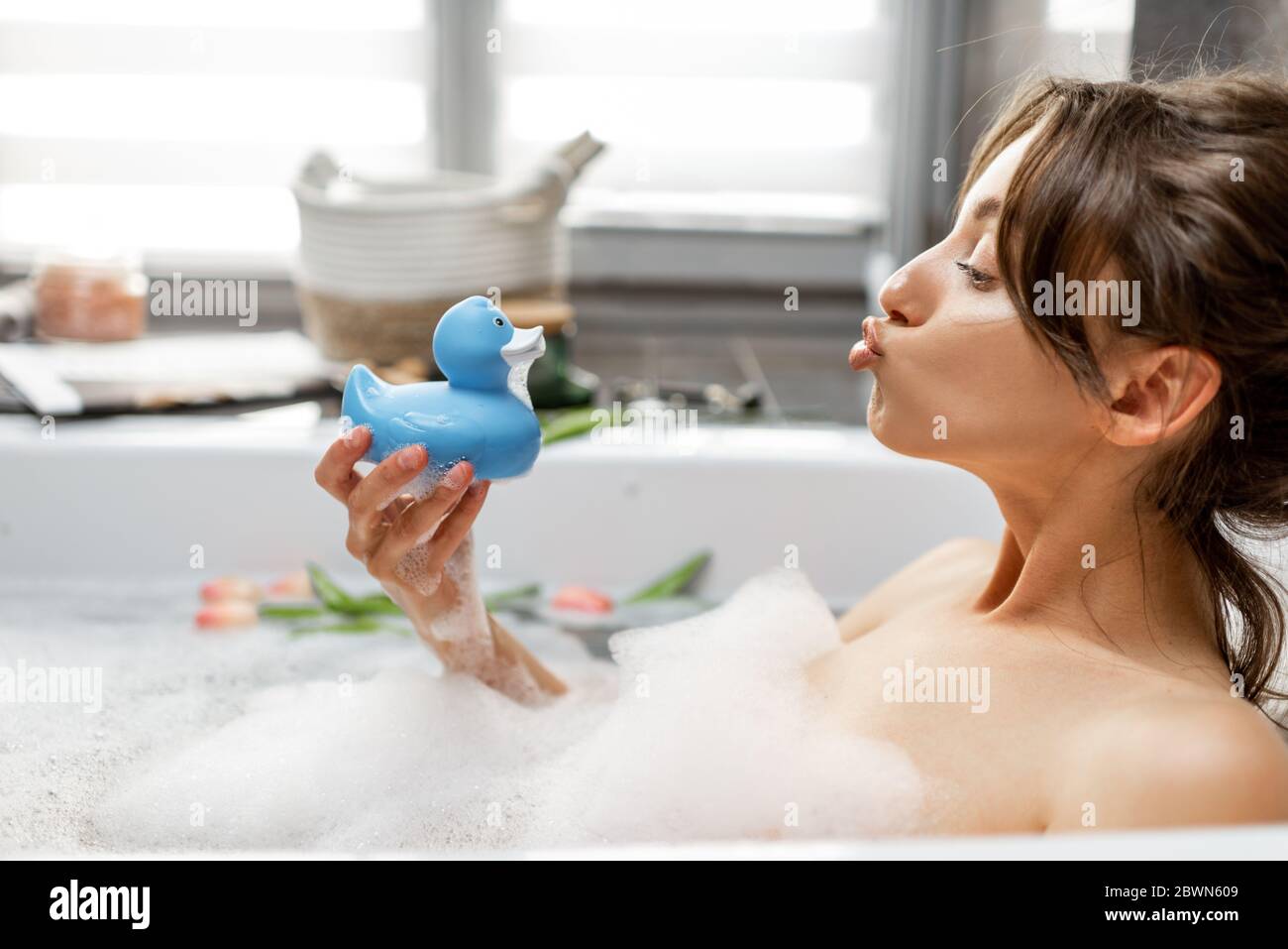 Young woman rubber duck hi-res stock photography and images photo