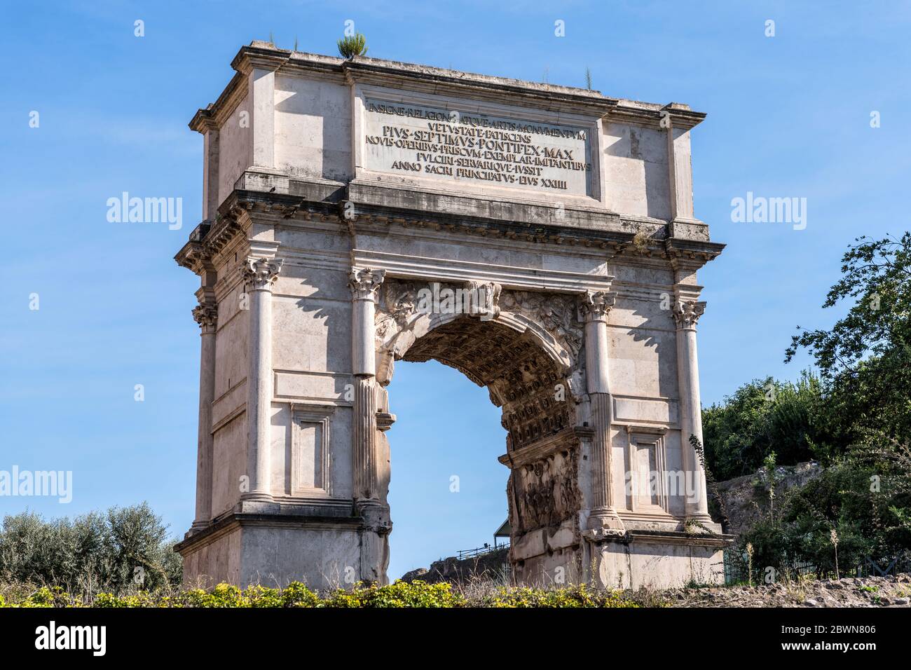 Arch of Titus - A closeup view of west side of 1st-century triumphal arch, Arch of Titus, in Roman Forum. Rome, Italy. Stock Photo