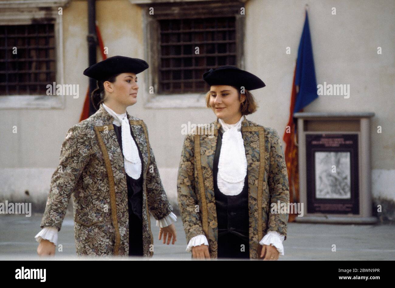 Italian women wearing Venetian costume and Tricorn black hats during the Venice Carnival, Italy pictured in 1983 Stock Photo