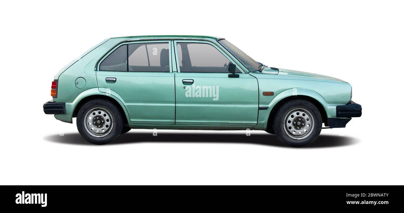 Classic Japanese hatchback car side view isolated on white background
