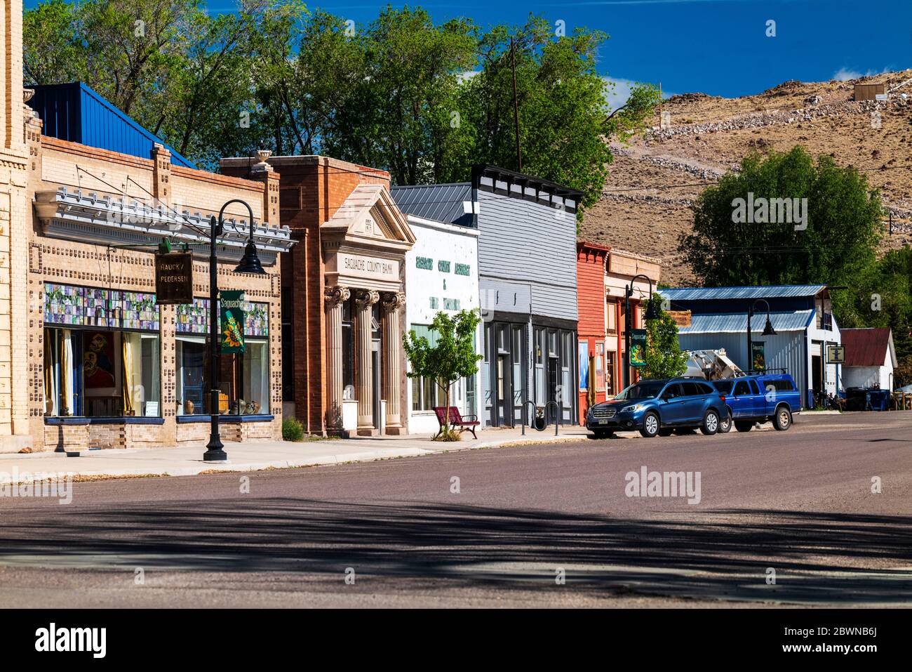 Shops & businesses line historic Fourth Street; small town of Saguache;  San Luis Valley; Central Colorado; USA Stock Photo