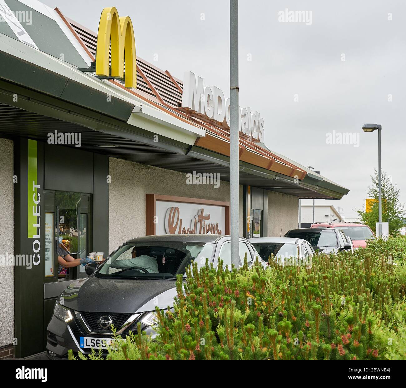 McDonalds Drive Thru, 2 Linkwood Place, Elgin, Moray, UK. 2nd June, 2020. UK, IV30 1HZ. This is some of the first customers at the vey well organised McDonalds in Elgin. Ques did form however, Police No waiting Cones had been placed to secure spaces for que. Credit: JASPERIMAGE/Alamy Live News Stock Photo