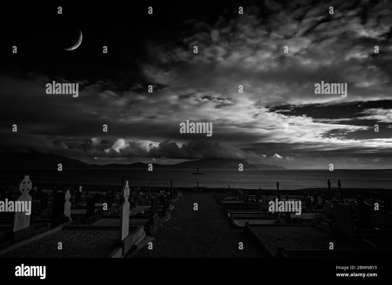 Nightfall over the graveyard near Saint Dervla's Abbey, The Mullet Penninsula, County Mayo, Ireland Stock Photo