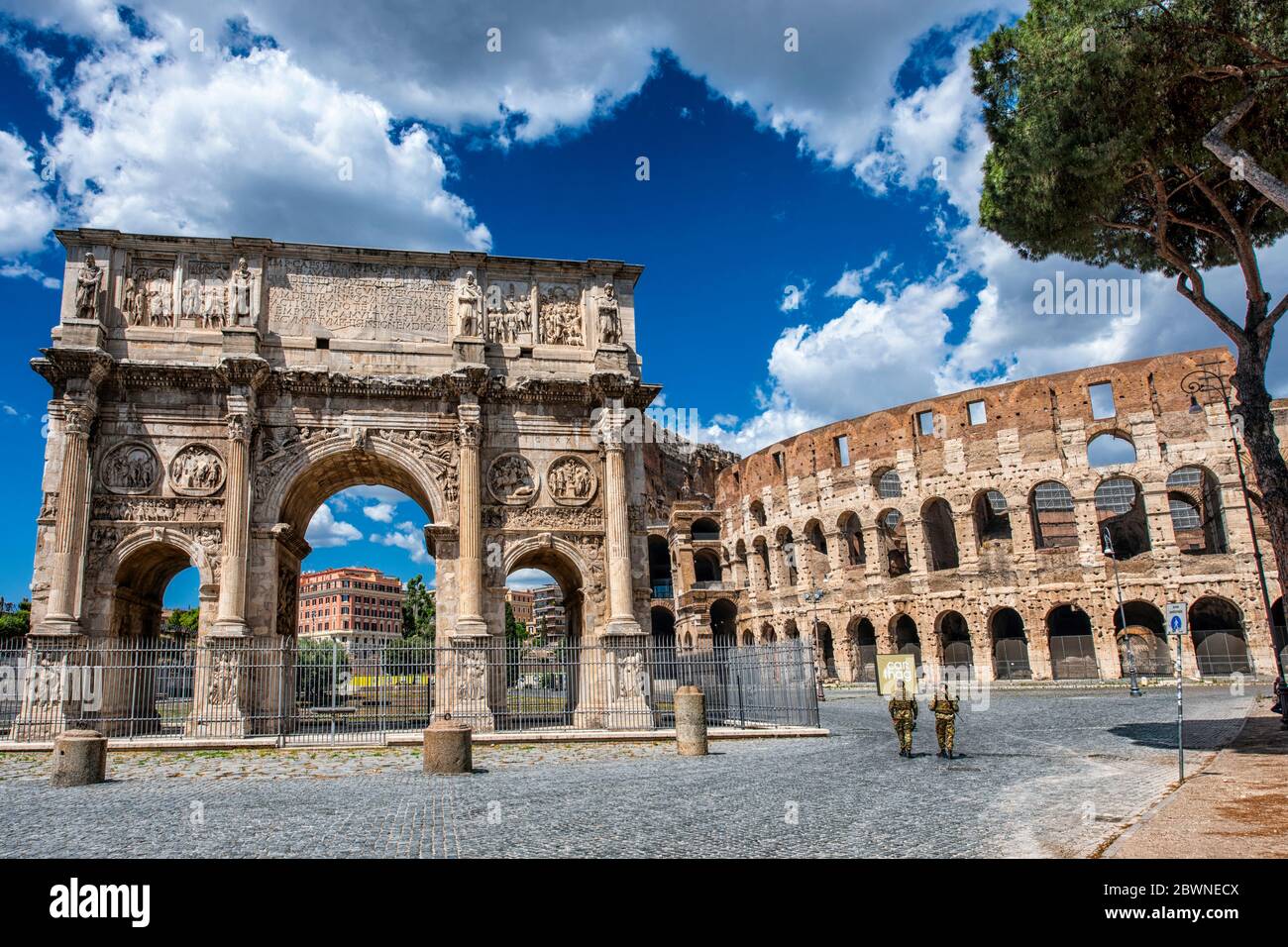 Italy Lazio Rome in lockdown: Arch of Constantine and Coliseum - Arco di Costantino e Colosseo Stock Photo