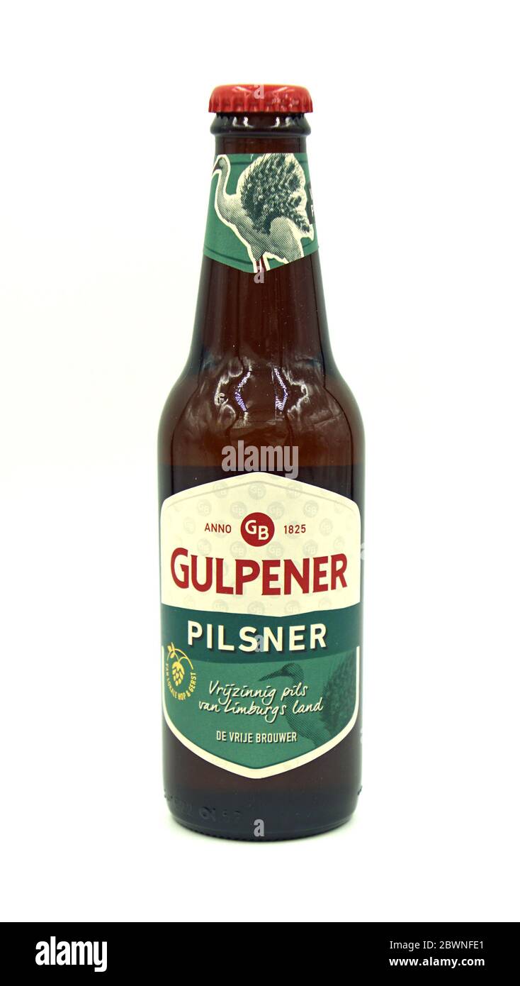Gulpen, the Netherlands - May 29, 2020: Bottle of Gulpener Pilsener beer against a white background. Stock Photo