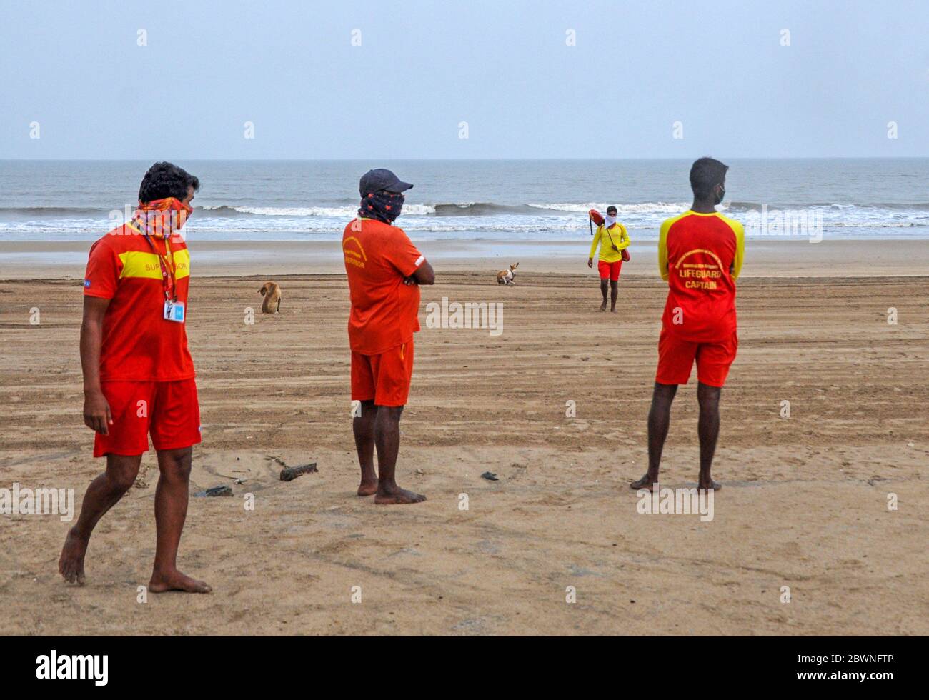 Lifeguards patrol the beach in preparation for the cyclone. India Meteorological Department (IMD) says that tropical cyclone ?isarga?has headed for the Maharashtra coast. People have been advised to stay indoors, be prepared to face possible power cuts as strong winds hit the city. National Disaster Response Force (NDRF) has positioned nine teams in vulnerable districts. Stock Photo