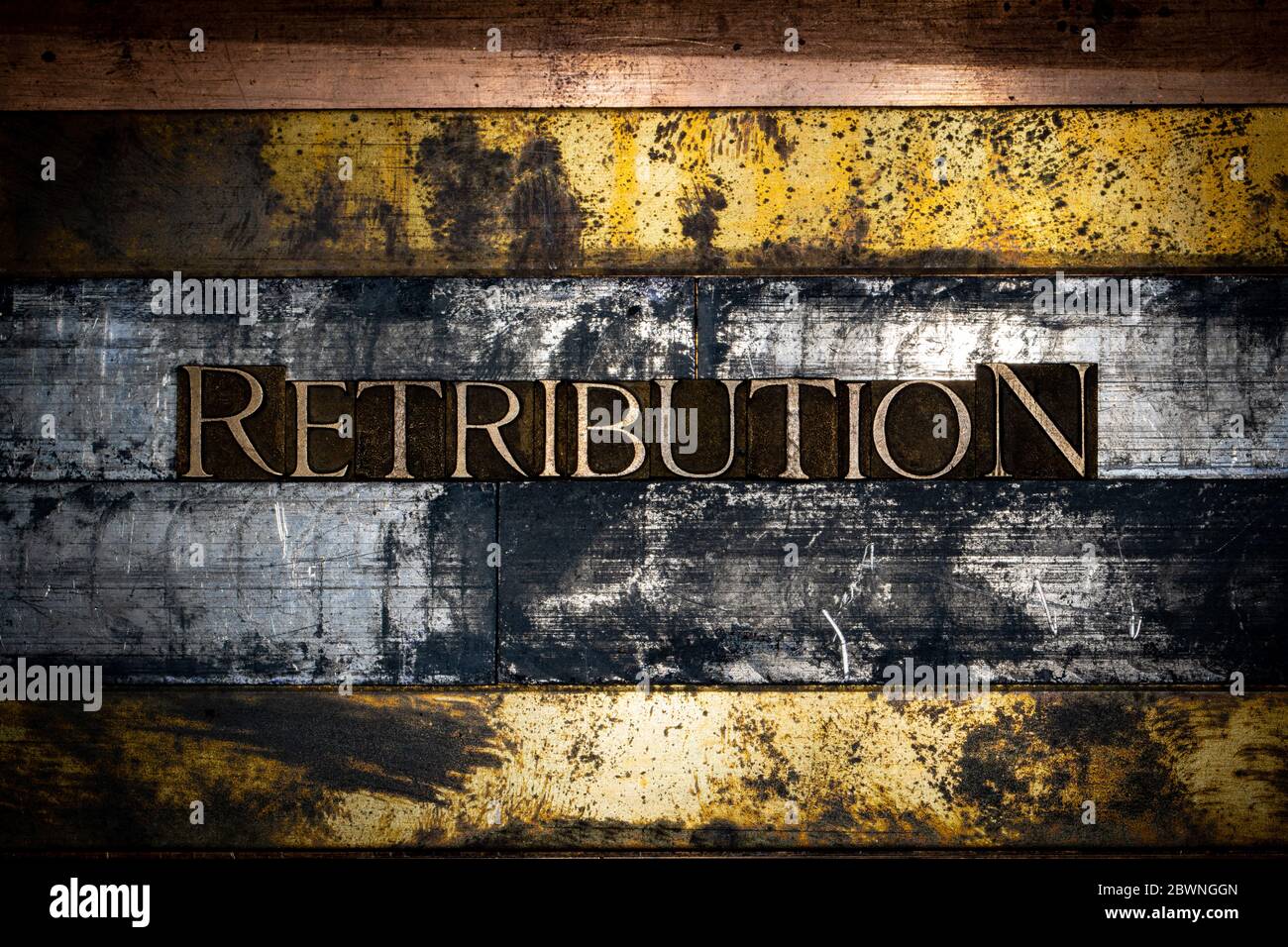 Photo of real authentic typeset letters forming Retribution text on ...
