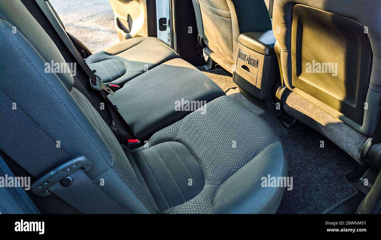 Car interior inside is empty. Rear seat view for passengers. Stock Photo