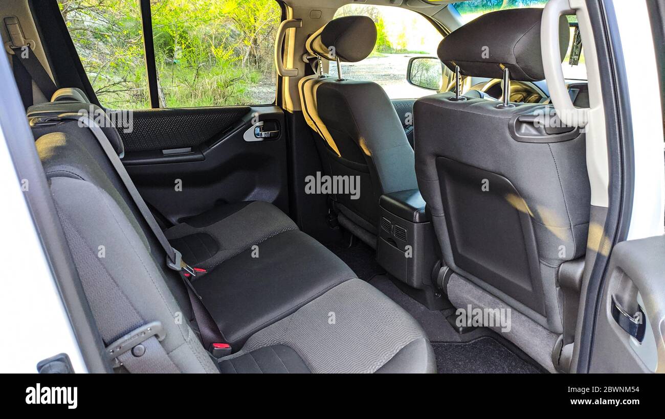 Rear seat view for passengers. Car interior inside is empty. Stock Photo