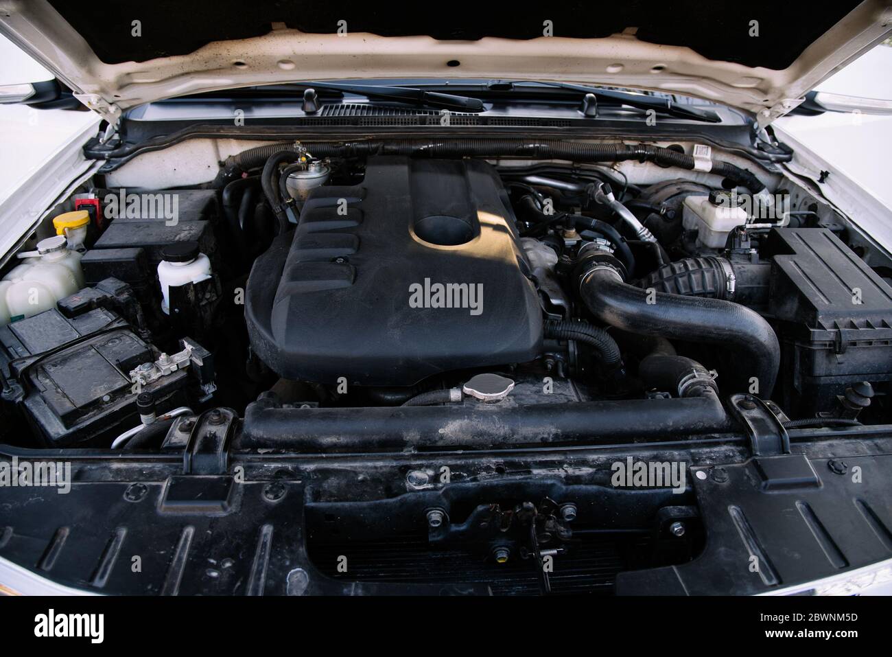 Car engine, undercover space auto Stock Photo - Alamy