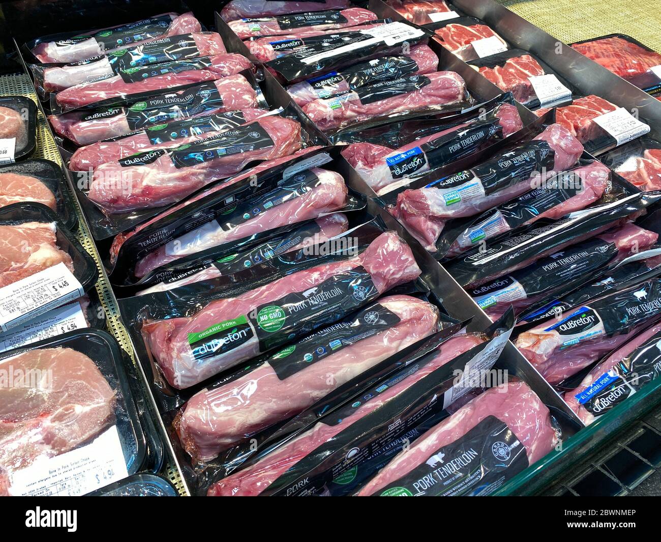 Orlando,FL/USA -5/10/20:  A refrigerated case of packaged pork tenderloin ready for customers to purchase at a Whole Foods Market grocery store. Stock Photo
