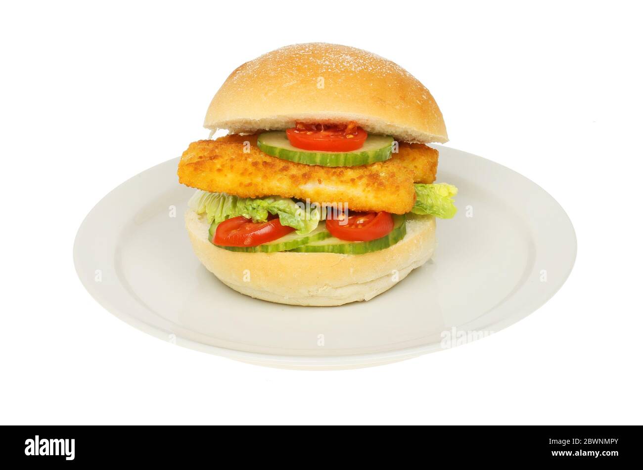 Fish fingers and salad in a bread roll on a plate isolated against white Stock Photo