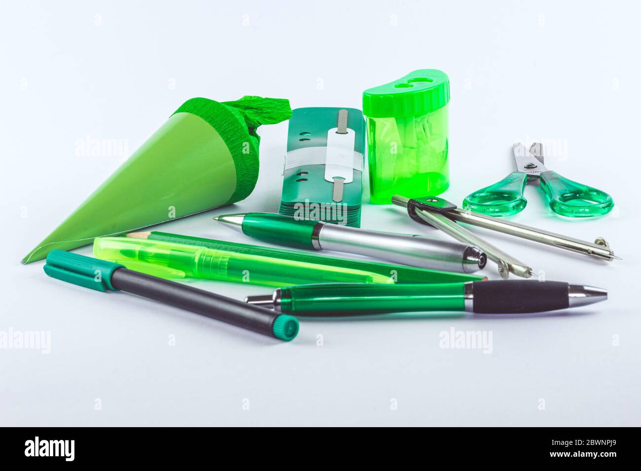 various writing utensils for school and office in green Stock Photo Alamy