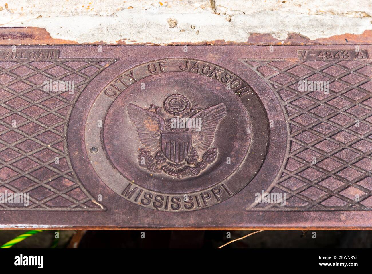 Jackson, MS / USA, June 1, 2020: Storm drain with seal of the the City of Jackson, Mississippi on it. Stock Photo