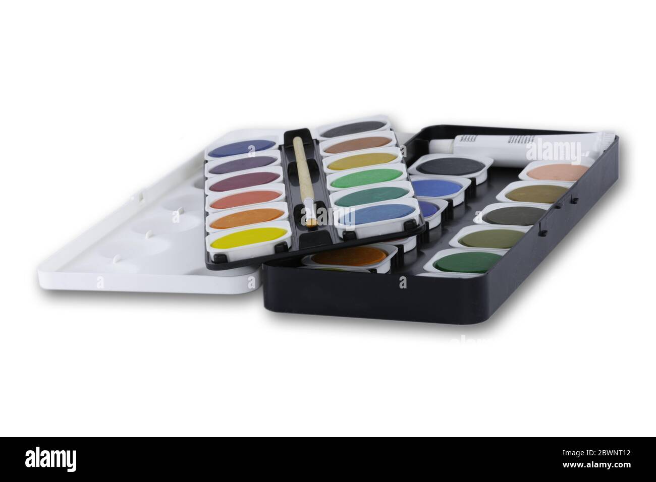 Water color box with 24 different colors, opaque white and brush on a light background Stock Photo
