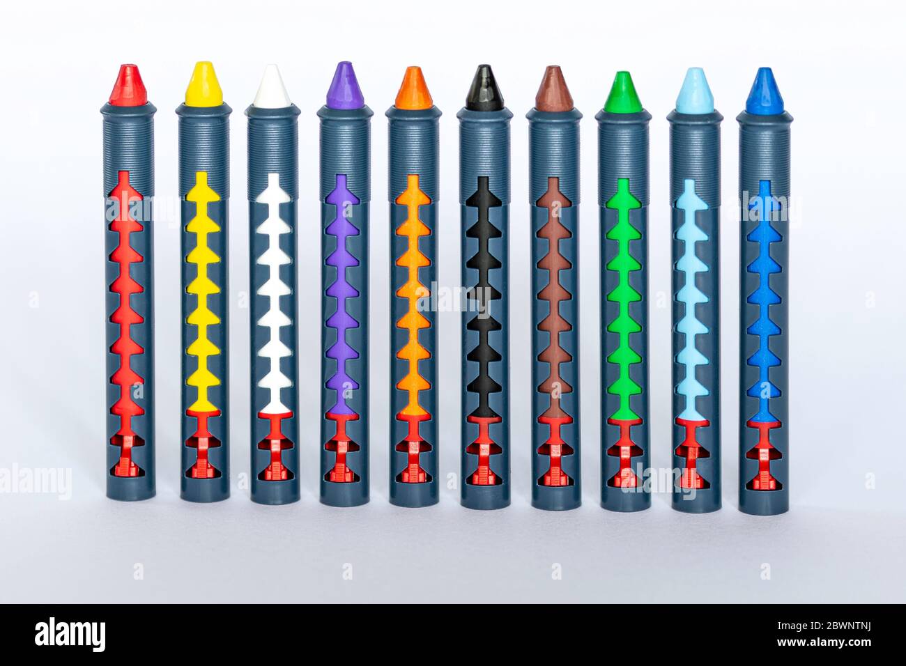 Ten different colored crayons standing on a white surface Stock Photo ...