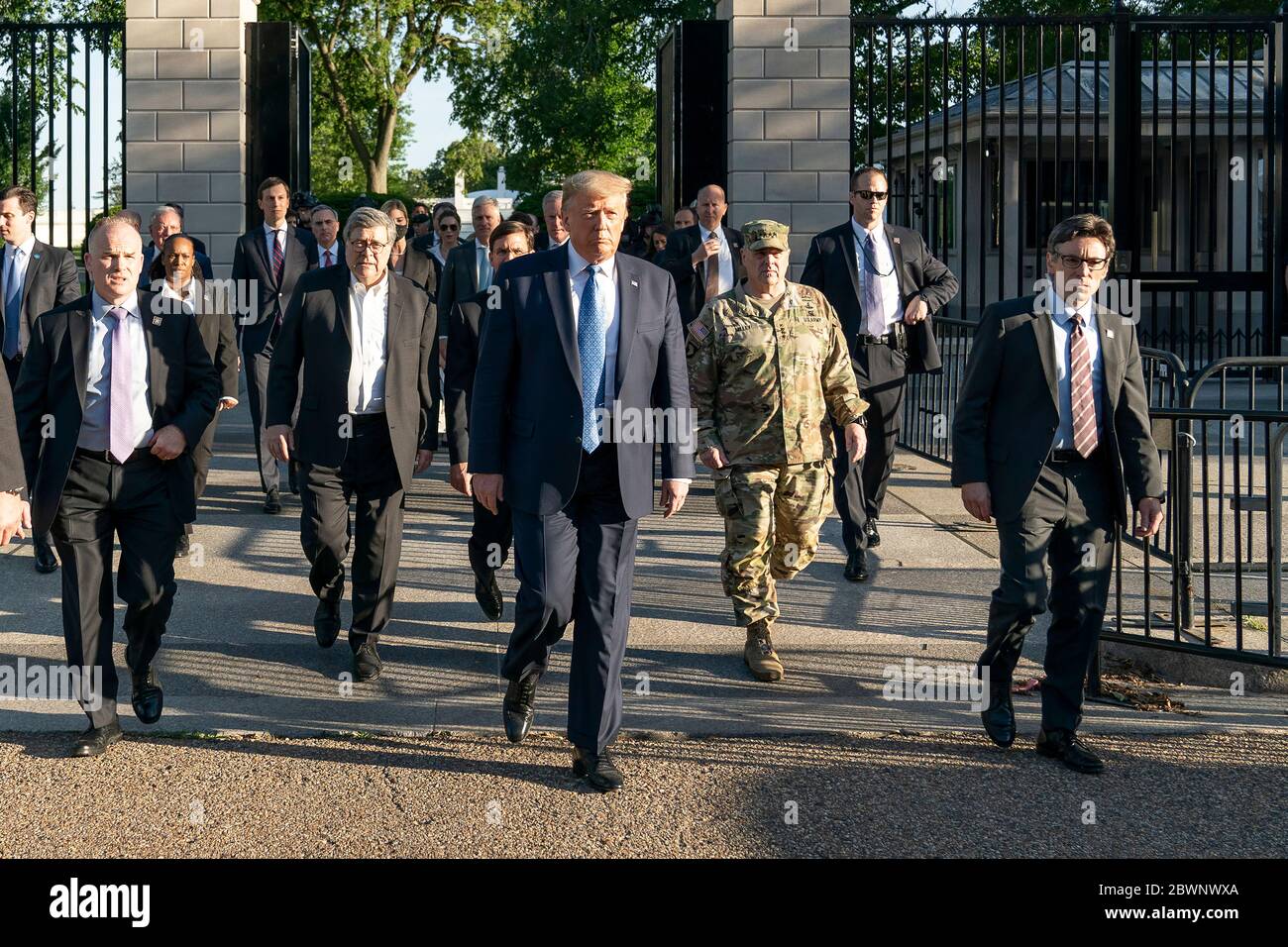 U.S. President Trump Visits St. John's Episcopal Church. President Donald J. Trump walks from the White House Monday evening, June 1, 2020, to St. John’s Episcopal Church, known as the church of Presidents’s, that was damaged by fire during demonstrations in nearby LaFayette Square Sunday evening. General Mark Milley walks behind Trump and breaks off shortly after he realizes that he's been 'set up' by Trump to be in a political visual. Stock Photo
