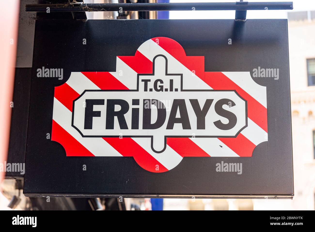 TGI Fridays logo and slogan on their restaurant in Leicester Square. Stock Photo