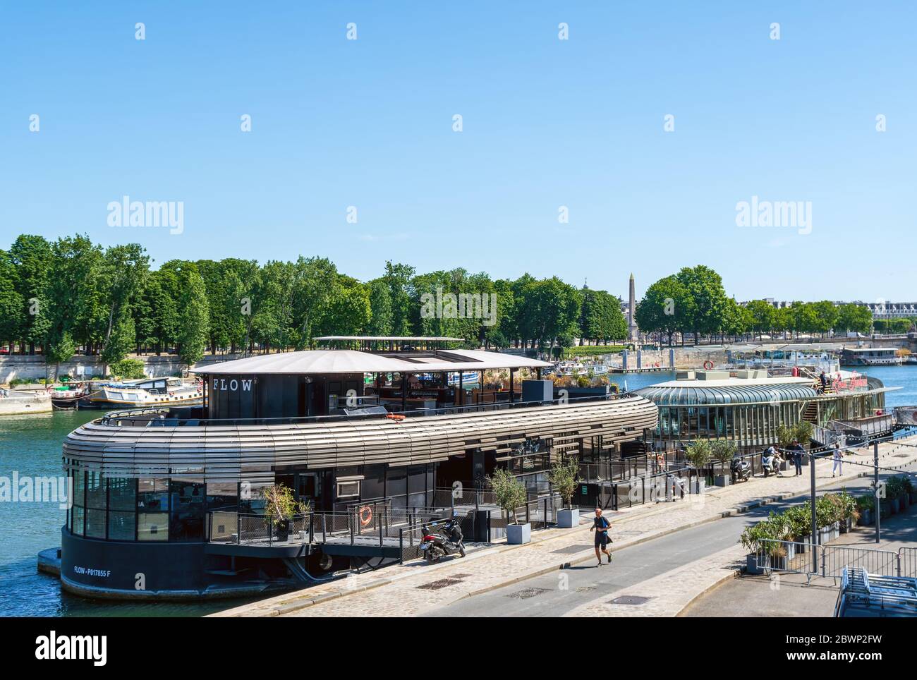 Flow boat, floating restaurant on the Seine river in Paris Stock Photo