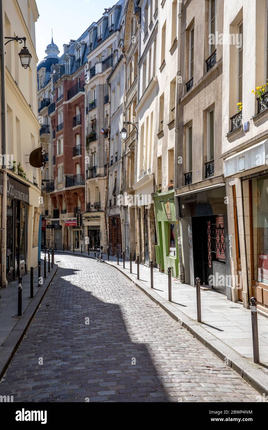 Paris, France - April 1, 2020: 16th day of containment because of Covid-19 in a street of Quartier Latin Stock Photo