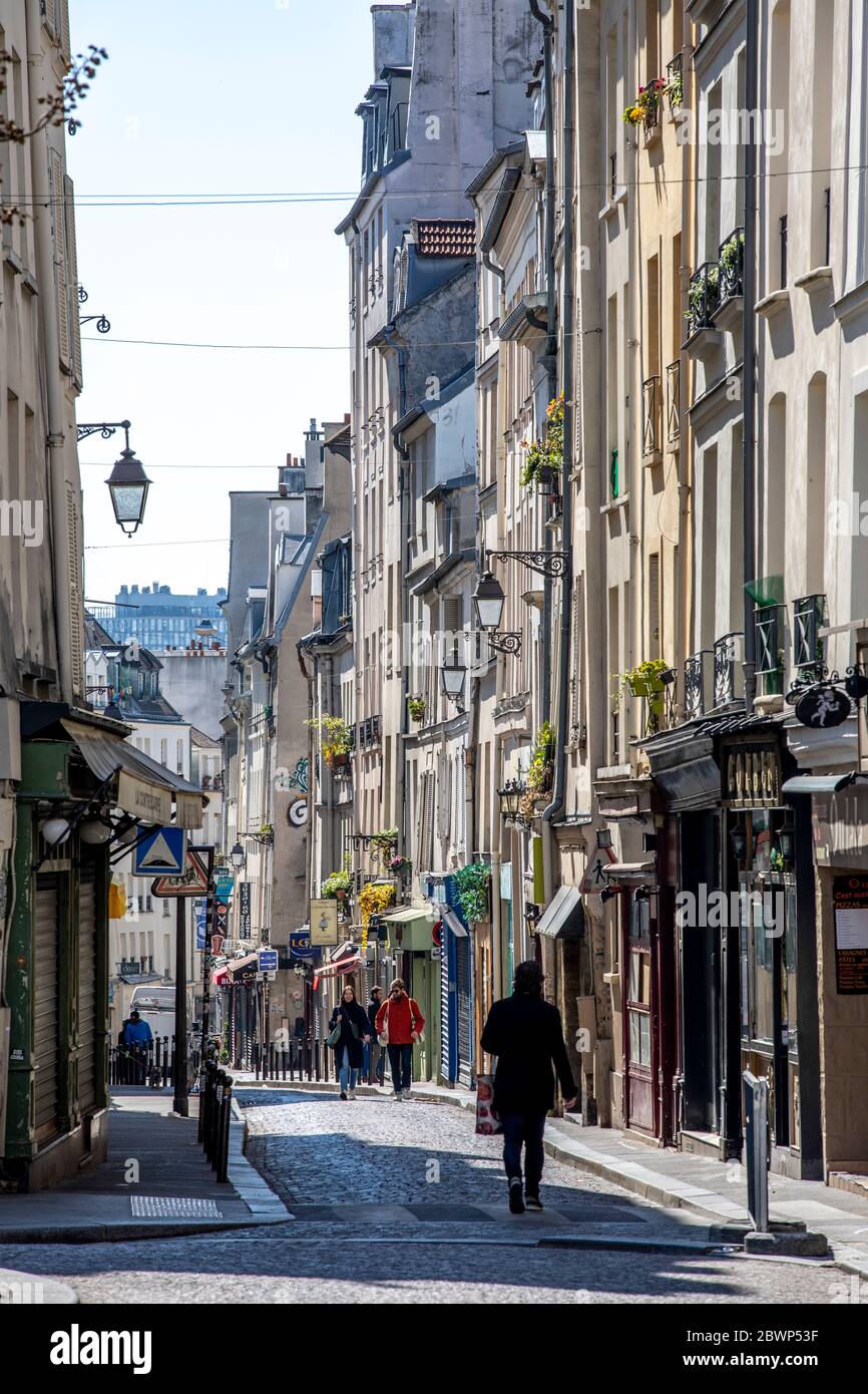 Paris, France - April 1, 2020: 17th day of containment because of Covid-19 in Mouffetard street in Paris Stock Photo