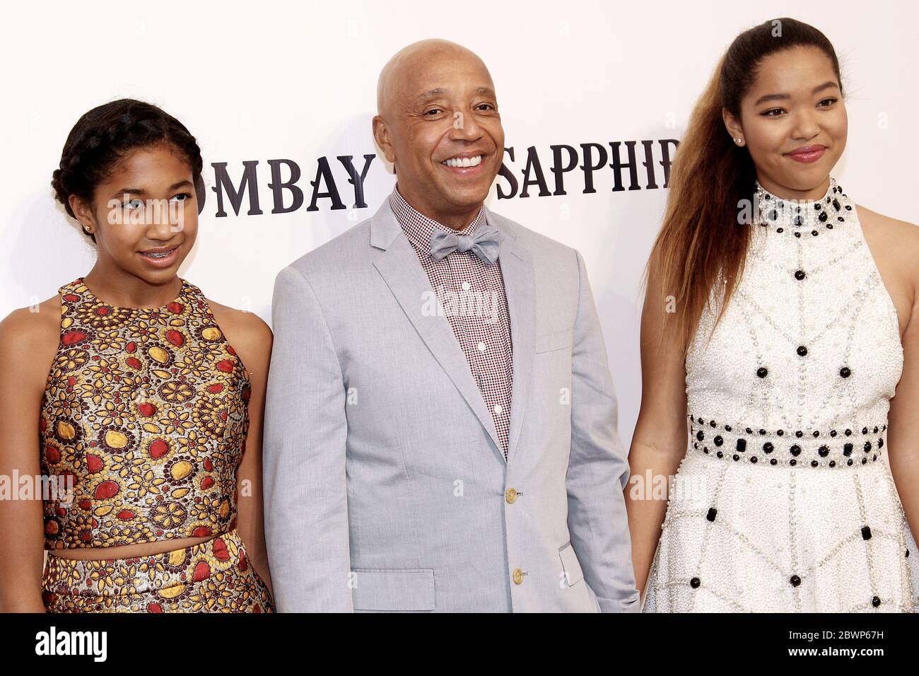 Southampton, NY, USA. 18 July, 2015. Ming Lee, Russell Simmons, Aoki Lee at the Rush Philanthropic ArtsFoundation's 20th Anniversary 'Art For Life' Benefit at Fairview Farms. Credit: Steve Mack/Alamy Stock Photo