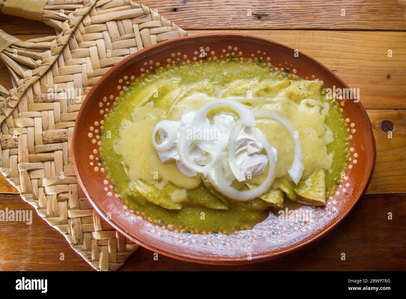 Traditional mexican green enchiladas Stock Photo Alamy