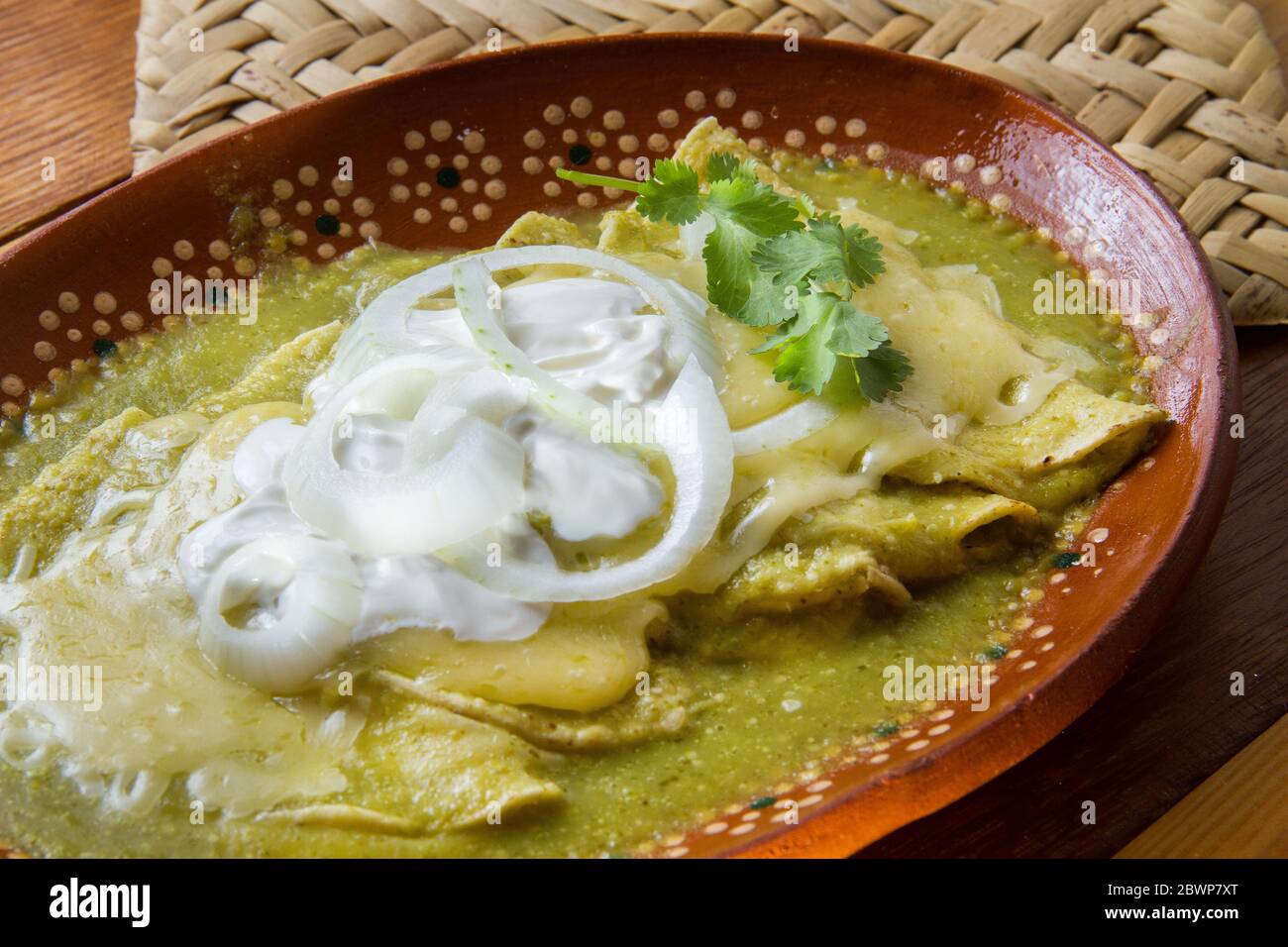 Mexican green enchiladas with cheese Stock Photo Alamy