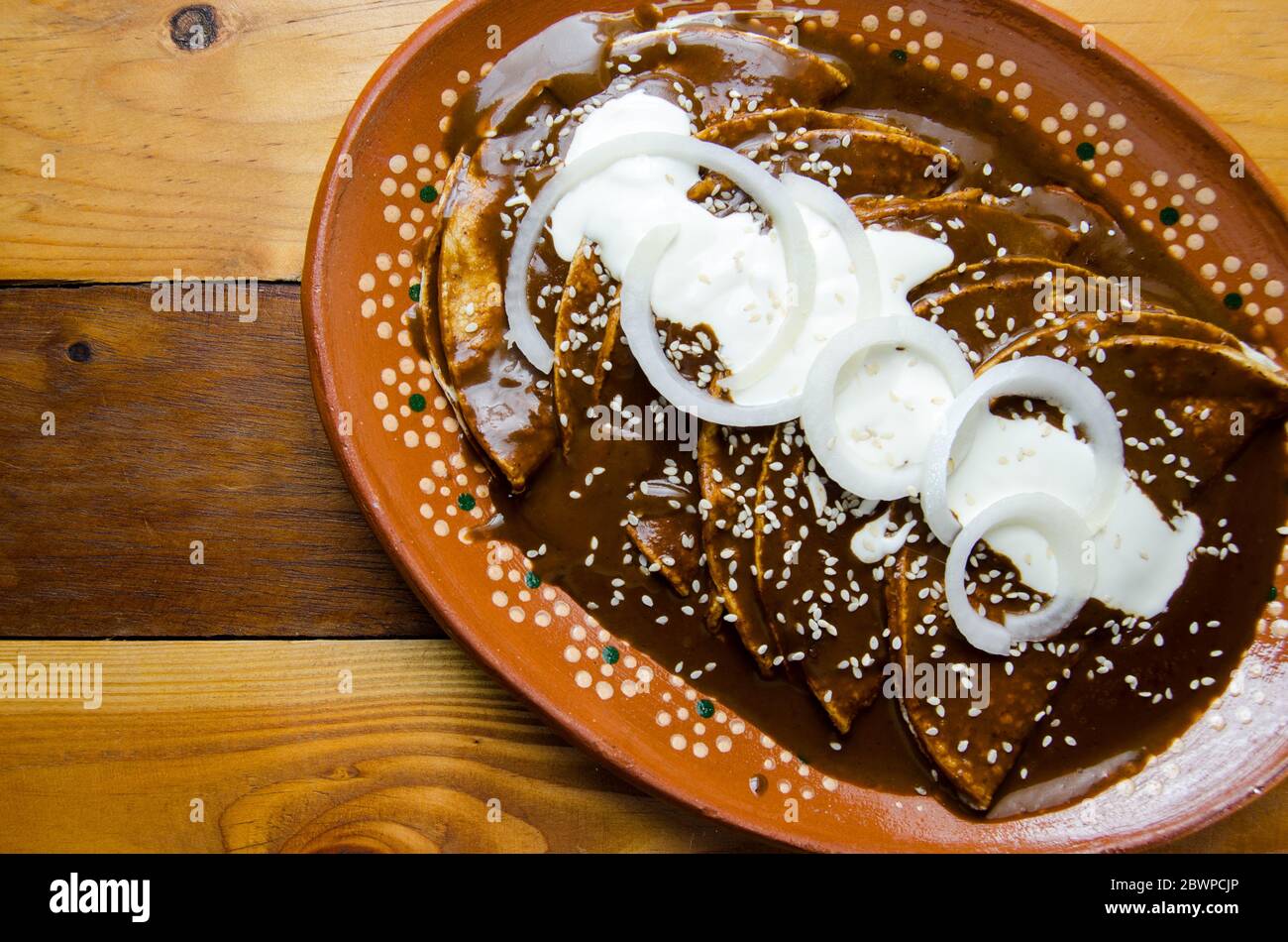 Traditional mexican enchiladas with mole sauce Stock Photo Alamy
