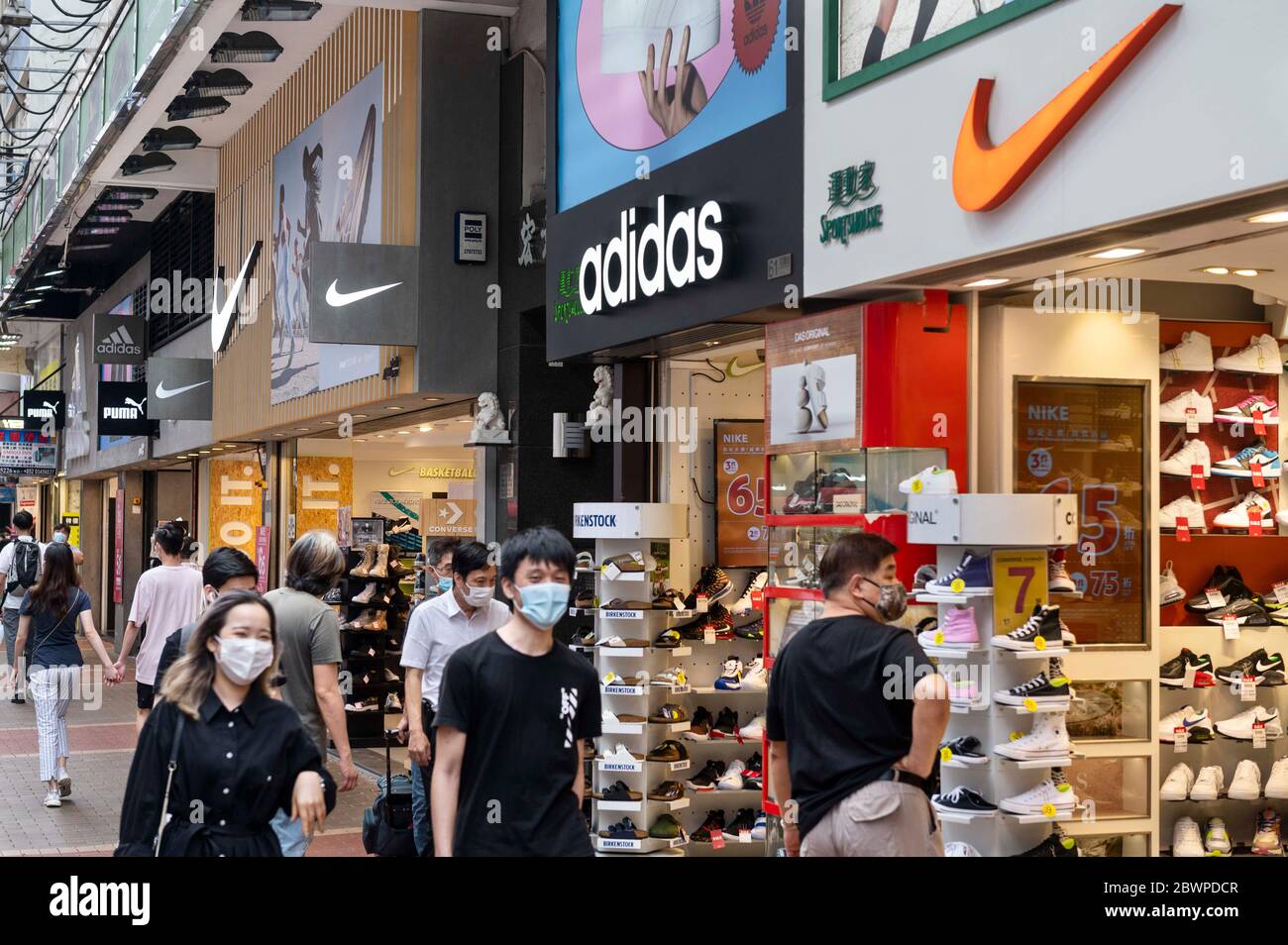Hong Kong, China. 29th May, 2020. Multinational sports clothing brands  Adidas, Puma and Nike logos seen at a store in Hong Kong. Credit: Budrul  Chukrut/SOPA Images/ZUMA Wire/Alamy Live News Stock Photo -