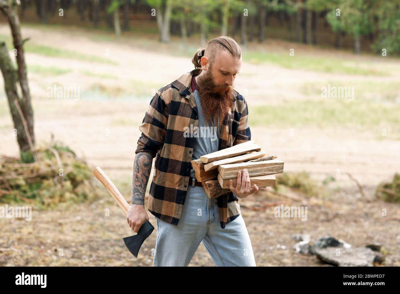 Eco lifestyle. United with environment. Handsome lumberjack. Man