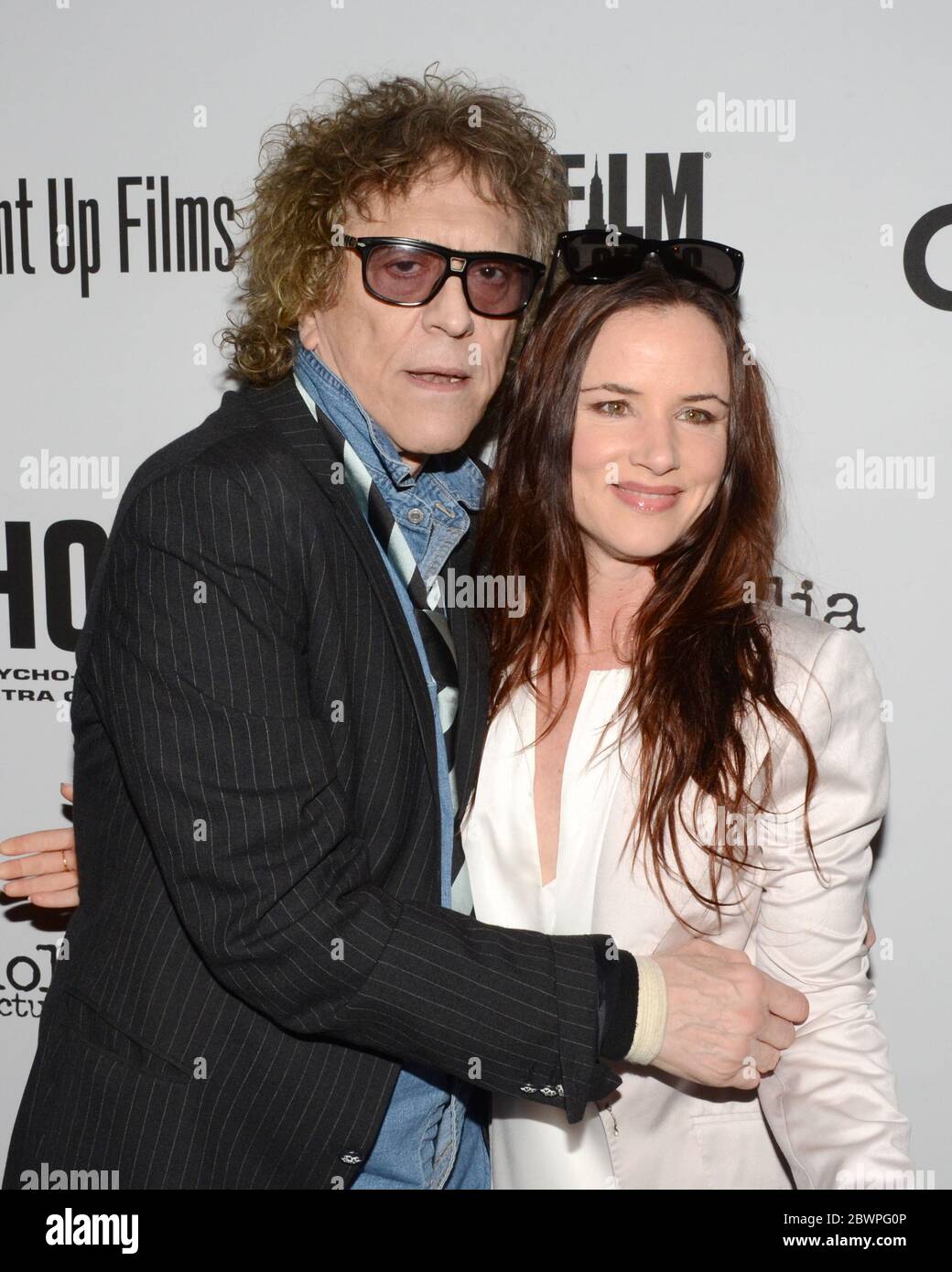 April 5, 2017, Los Angeles, California, USA: Mick Rock and Juliette Lewis arrive for the Premiere Of 'SHOT! The Psycho-Spiritual Mantra of Rock' held at Pacific Theatres  in Los Angeles, California at The Grove on April 5, 2017. (Credit Image: © Billy Bennight/ZUMA Wire) Stock Photo