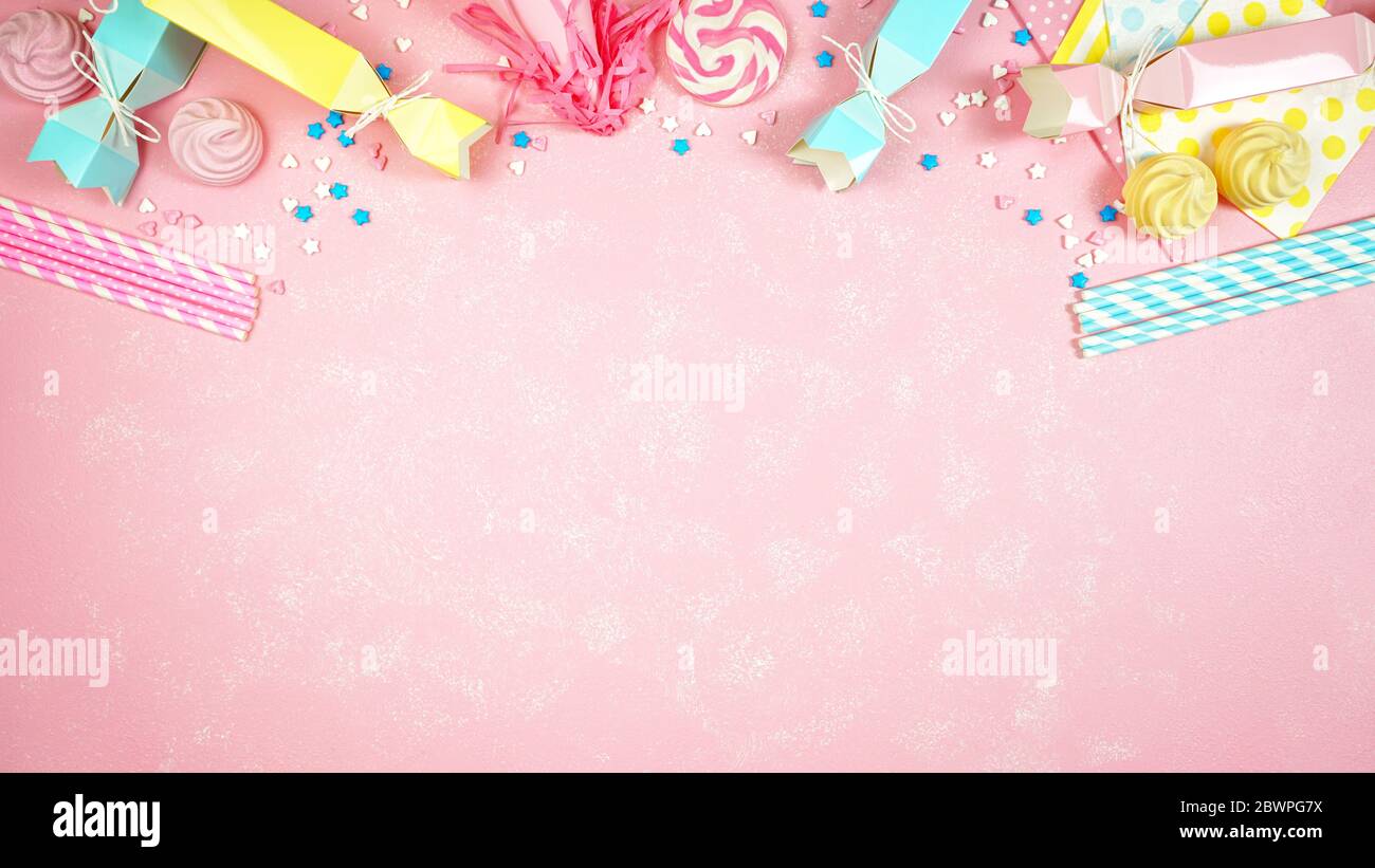 Happy birthday party pastel colors theme modern creative layout flat lay  with decorations, party hats and food on pink textured background with  decora Stock Photo - Alamy
