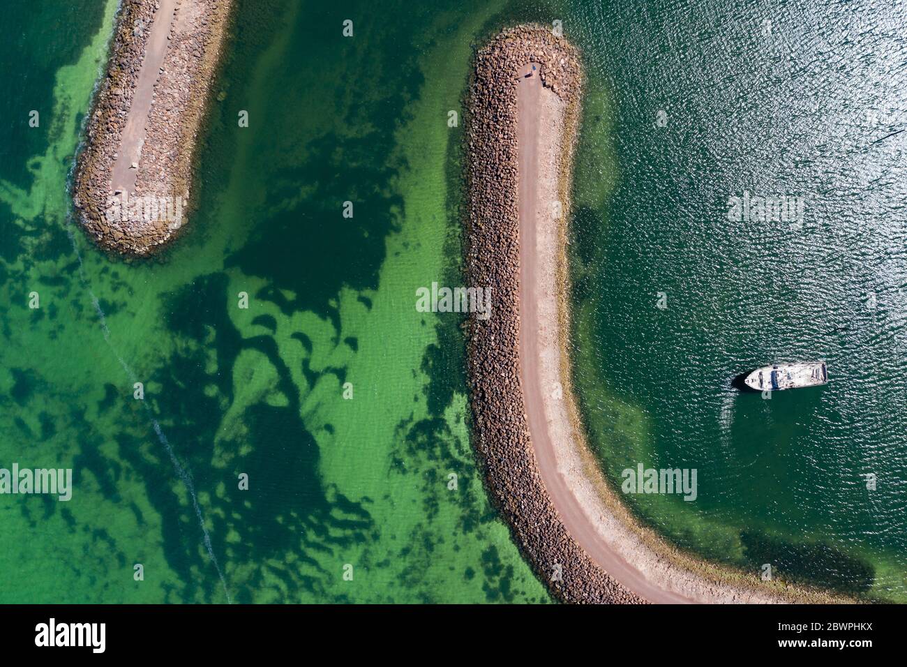 Overhead view of a solitary boat moored in the marina at Whyalla in South Australia Stock Photo