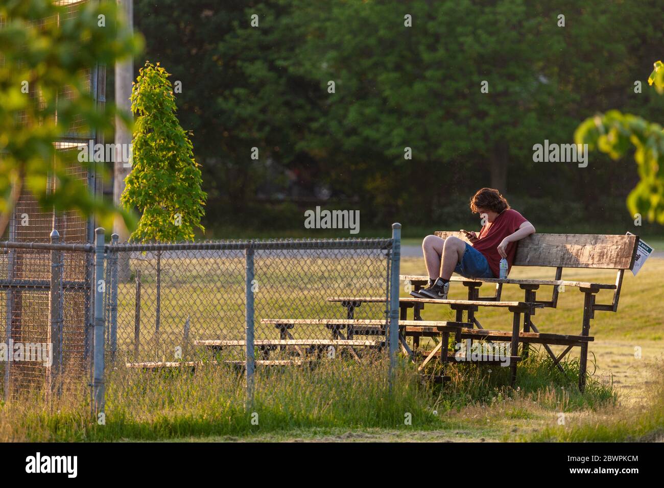 London, Canada - June 2, 2020. On any other warm summer night, baseball diamonds across the city would be busy till the sun goes down. In the age of COVID-19, they like many other places sit empty waiting for life to get back to normal. Mark Spowart/Alamy Live News Stock Photo