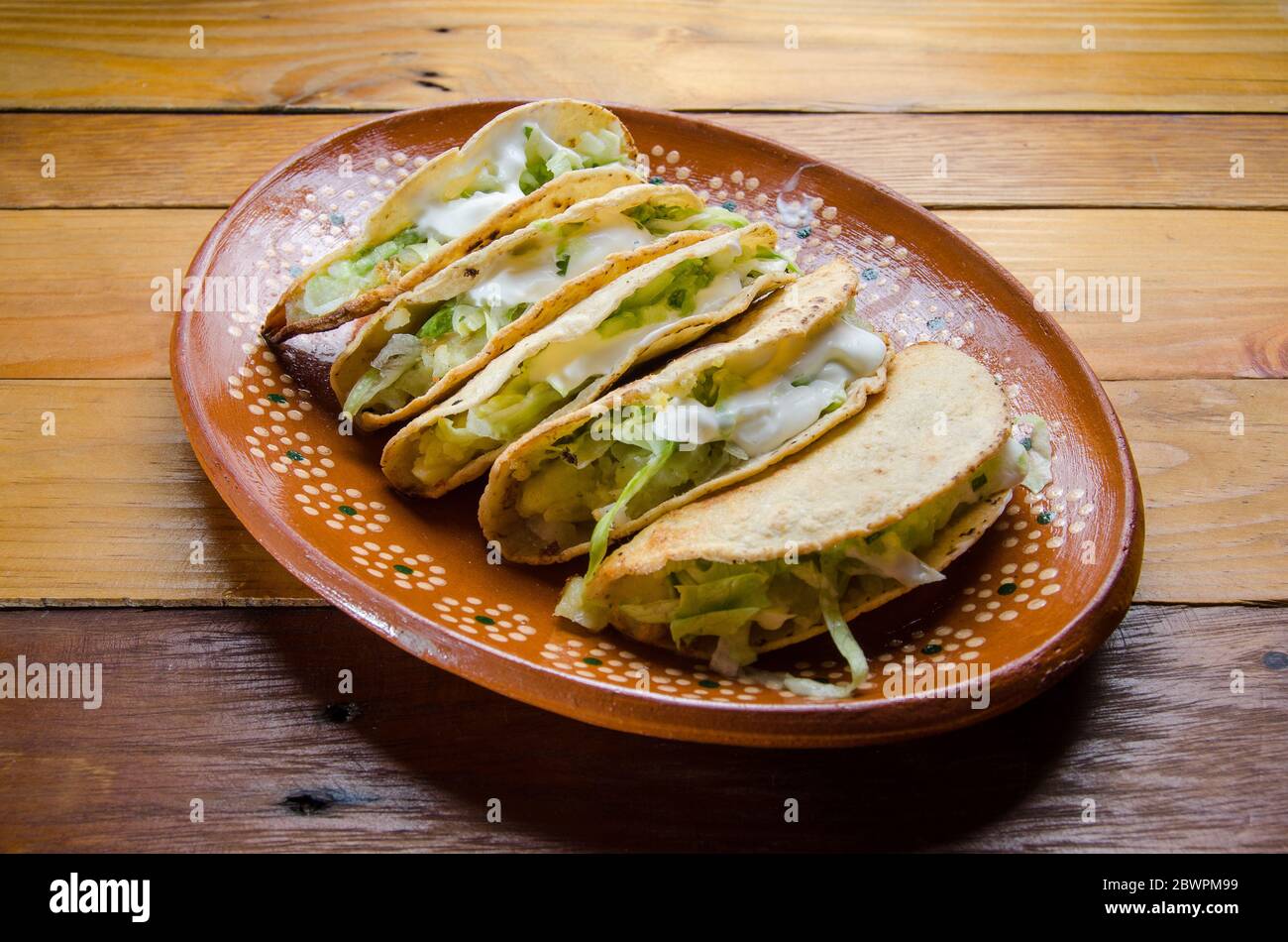 Traditional mexican tacos "dorados Stock Photo Alamy