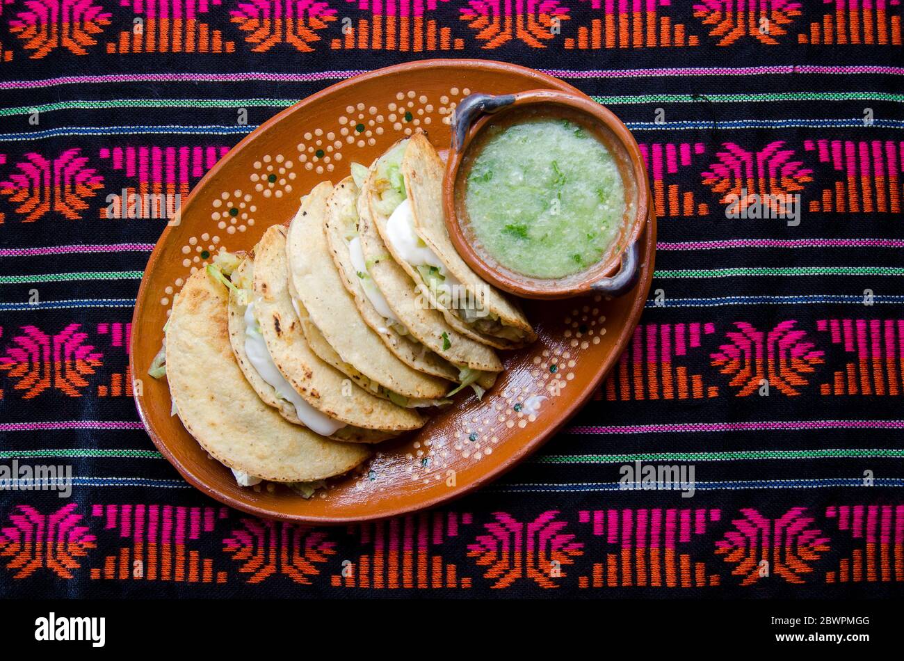 Authentic mexican tacos 'dorados' Stock Photo
