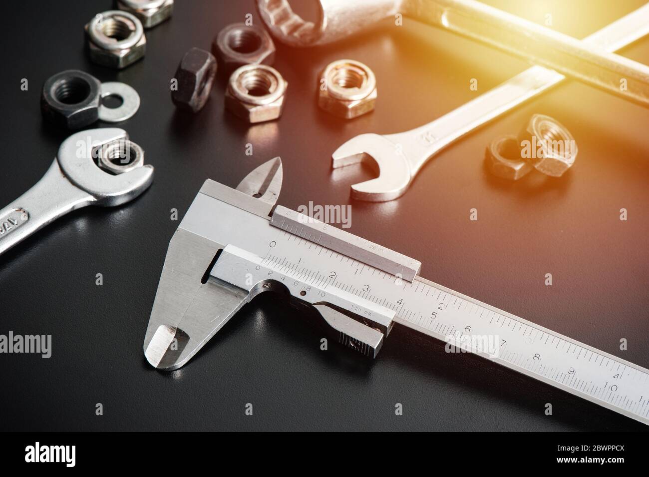 measuring the dimensions of part with metal vernier caliper, vernier