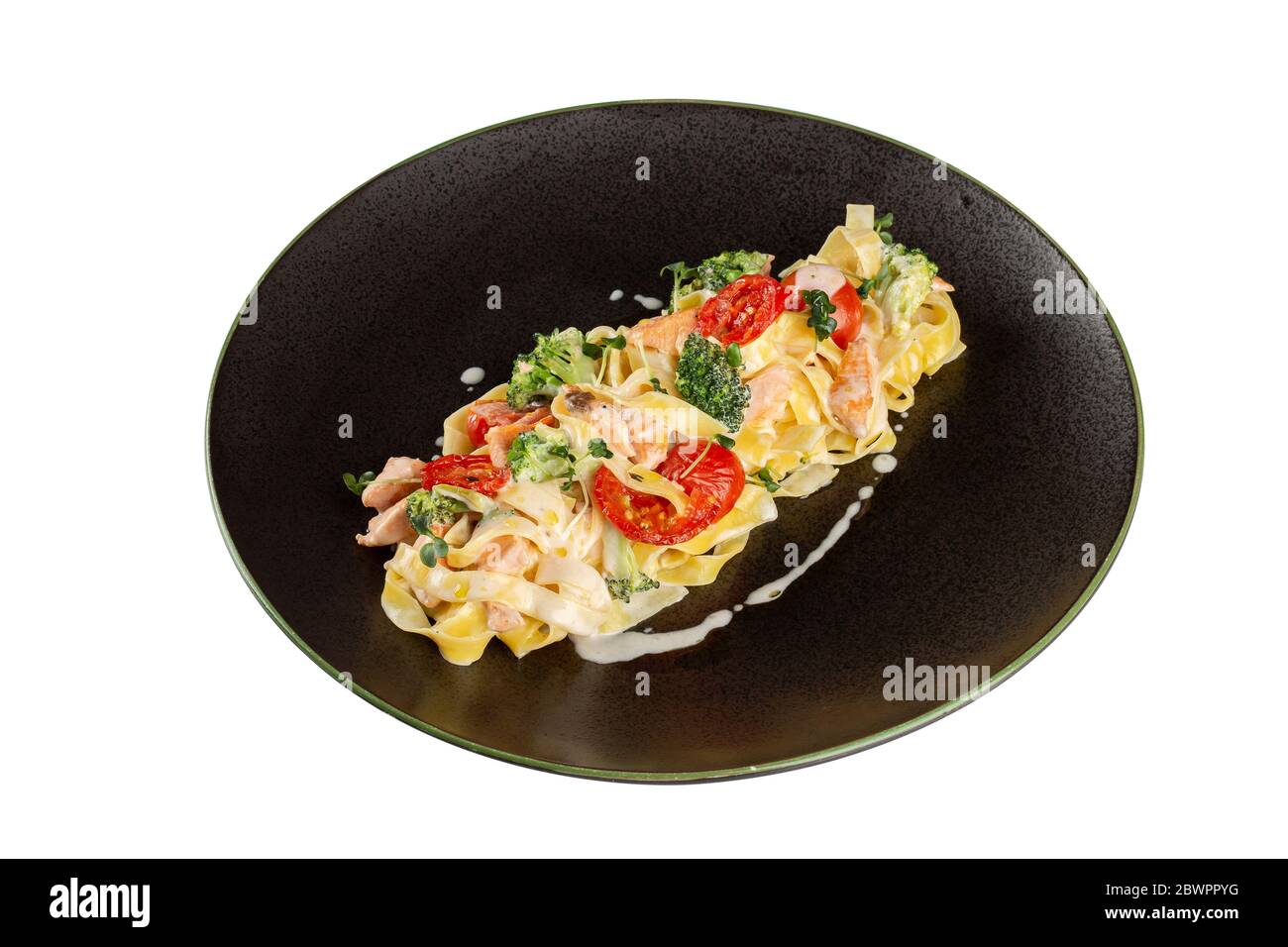 Fettuccine pasta with salmon and cream sauce Stock Photo - Alamy