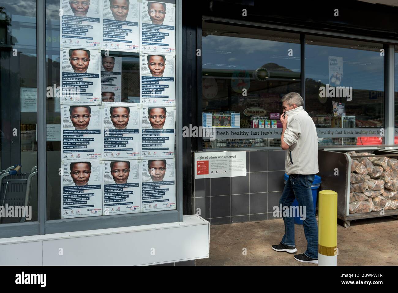 A Hout Bay shop appeals for food donations for residents of the adjacent Imizamo Yethu township during South Africa's coronavirus lockdown Stock Photo