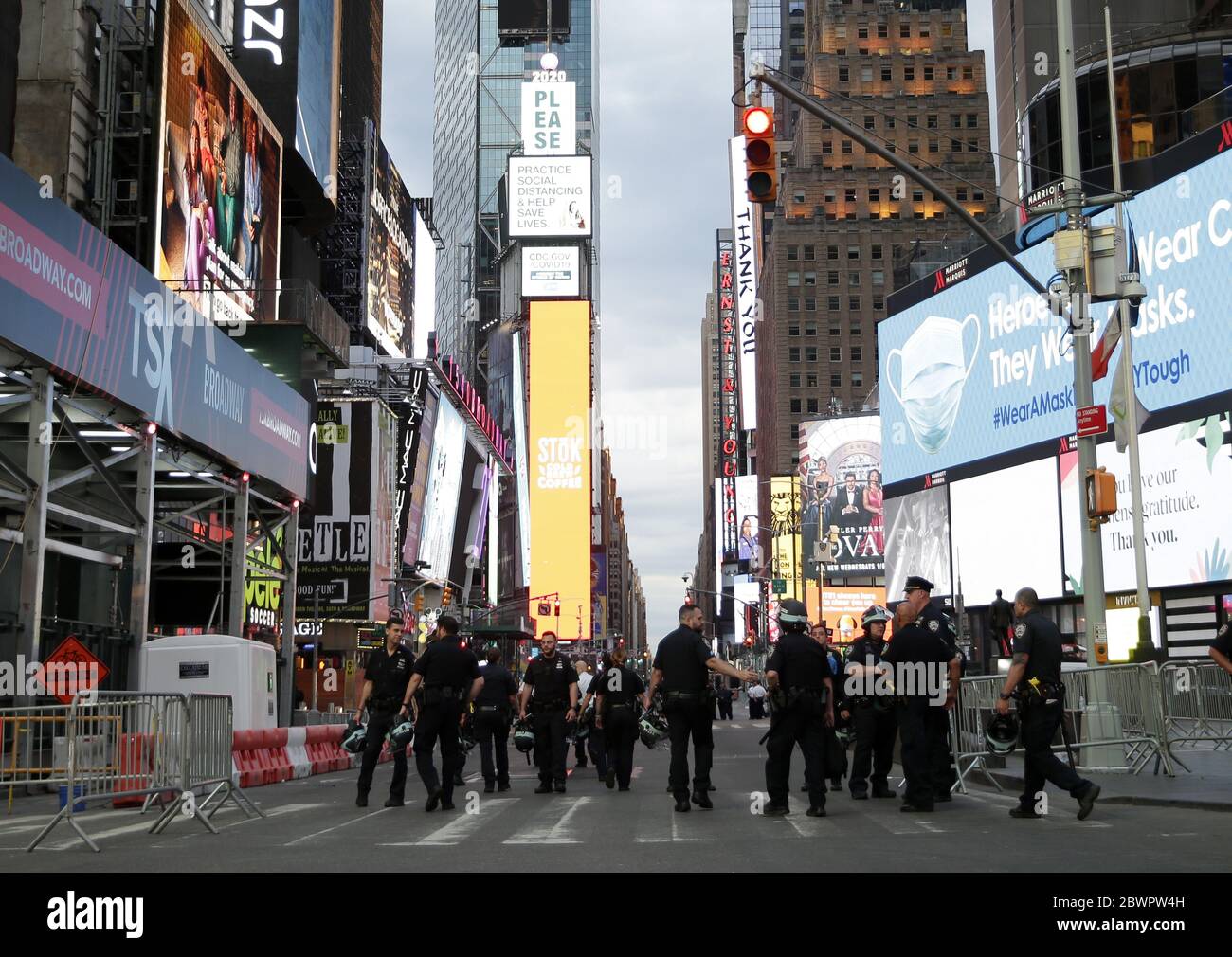 NYPD Police officers lock up Times Square before the 8 p.m. to 5 a.m. curfew for New York City on Blackout Tuesday and another night of unrest in Manhattan as protests, looting and rioting around the country continue over the death of George Floyd in New York City on Tuesday, June 2, 2020. Former Minneapolis police officer Derek Chauvin was arrested Friday days after video circulated of him holding his knee to George Floyd's neck for more than eight minutes before Floyd died. All four officers involved in the incident also have been fired from the Minneapolis Police Department. Photo by Joh Stock Photo