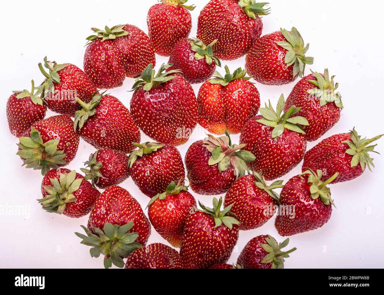 fresh ripe strawberries isolated on white background Stock Photo - Alamy